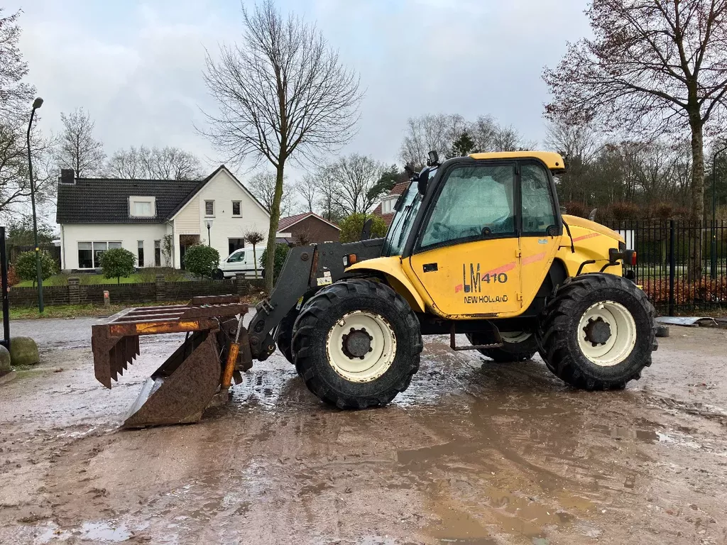 te koop new holland LM410 verreiker